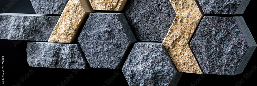 Fototapeta premium Hexagon stone wall texture geometric rock cladding decorative panel modern interior natural stone rough surface 3d pattern abstract background dark grey beige accent contemporary hexagon stone
