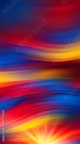 Vibrant abstract streaks of color, red, blue, yellow, sunburst effect