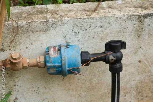 Old Water meter on the ground	