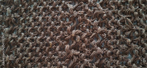 Brown Knitted Fabric Texture Background with Detailed Handcrafted Soft Crochet Pattern
