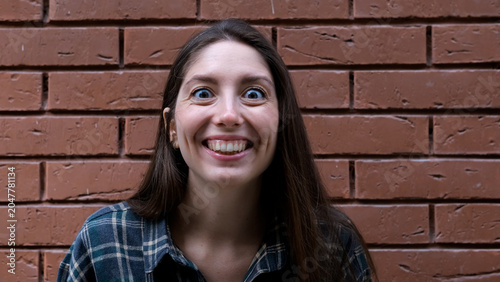 Картината върху платно A surprised, delighted woman