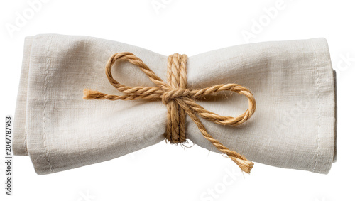 Foto Folded linen napkin tied with rustic twine knot, isolated on transparent backgro