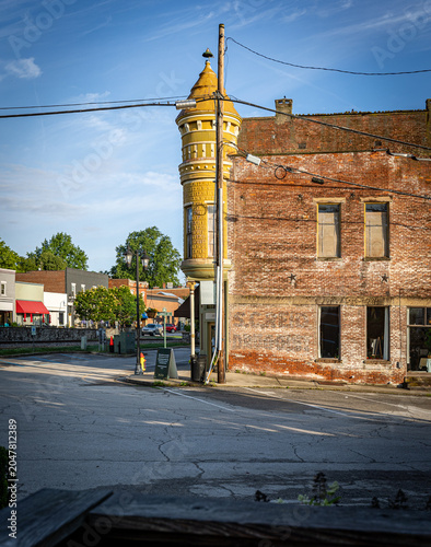 Circular tower projecting from the corner of a house called a turret in downtown Midway, Kentucky