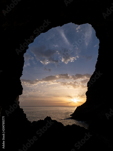 sunset in a cave on the beach in the Canary Islands
