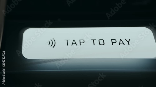 Tap To Pay button from a payment terminal, NFC technology
