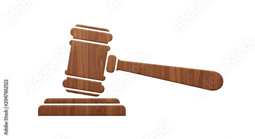 Wooden judicial gavel resting on a sounding block crafted from polished timber for legal concepts