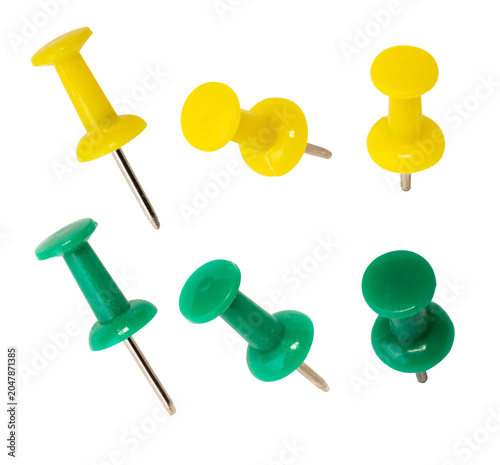 фотографія Yellow and green push pins set isolated on transparent background multiple angles office and school supplies organization concept