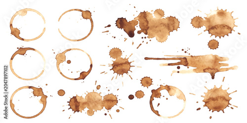 Set of brown coffee cup ring stains and messy drink splashes isolated on a simple plain surface for design