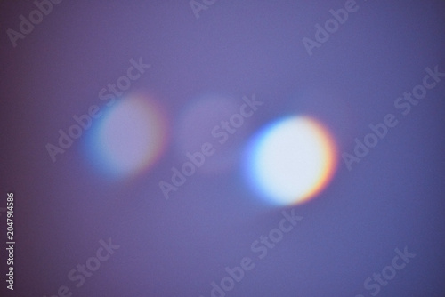 Photos Abstract purple background with soft, glowing and colorful out of focus bokeh lights