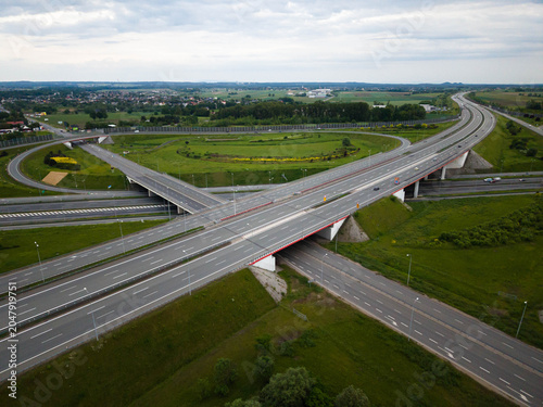 Fotografie Aerial wide-angle view of a large highway interchange cloverleaf junction