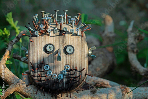 Tablou pe pânză Wooden head with nails and more