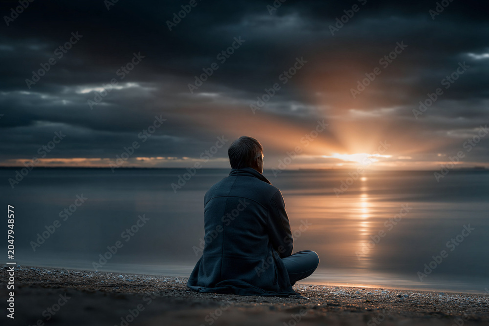 Fototapeta premium Meditative reflection at sunset serene beach photography tranquil environment wide angle mindfulness concept