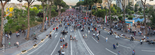 Obraz na płótnie Golden hour aerial panorama of Tirana protest crowd