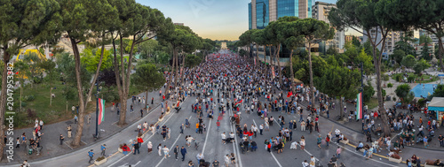 Obraz na płótnie Evening aerial view of Tirana boulevard during protest