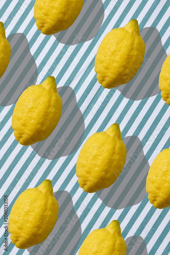 Foto Fresh Lemons for Homemade Lemonade on a Blue Striped Tablecloth for Picnic