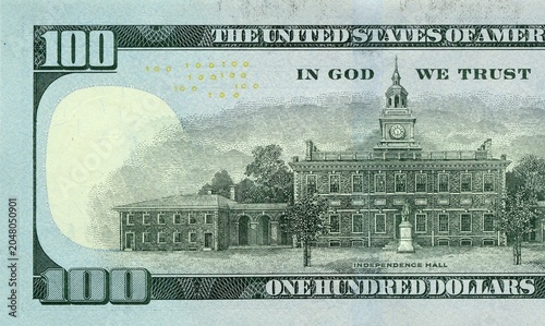 Fragment of a banknote of 100 dollars back for design purposes with Independence Hall image