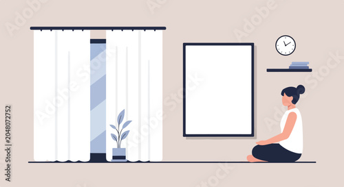 Photos A woman sits in a peaceful meditation pose inside a minimalist room featuring a large blank frame, a clock, and a window with curtains