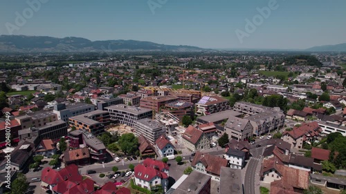 Aerial View of Garnmarkt District in Götzis with Urban Development and Alpine Landscape