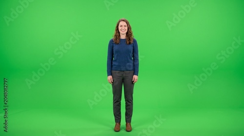 Full Length Businesswoman Standing on Green Screen Background for Chroma Key Video Production