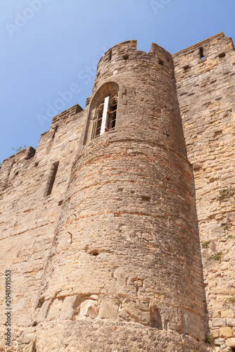 Εκτύπωση καμβά Ancient stone tower rises toward clear blue sky, Carcassonne