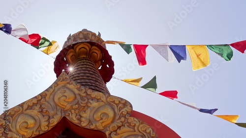 Sunburst Through Amitabha Stupa Crown and Prayer Flags Sedona Arizona