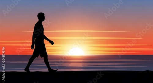 Silhouette of a person walking on a beach at sunset.