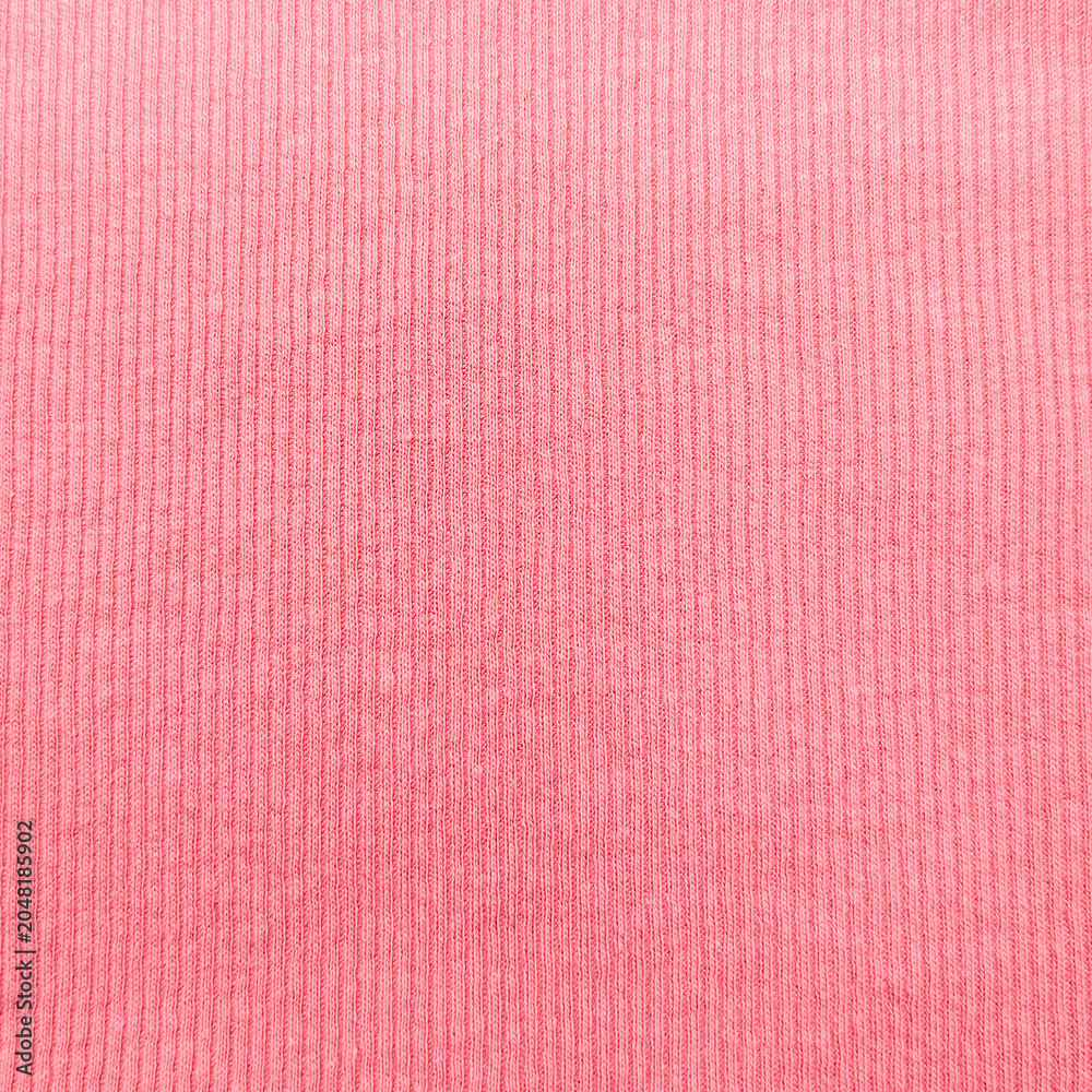 Fototapeta premium ​Coral Pink Ribbed Knit Fabric Seamless Texture for Apparel