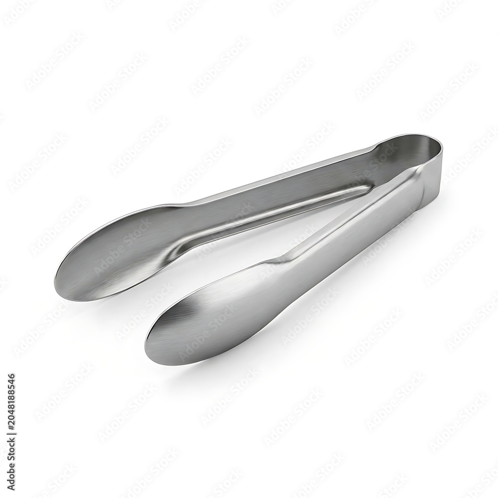 Fototapeta premium A pair of shiny metal tongs rests on a clean surface indoors.