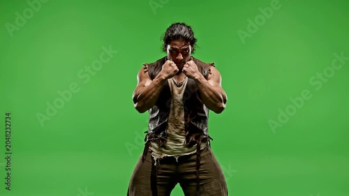 Muscular Male Athlete Posing Strongly On A Green Screen Background For Fitness And Action Themed Projects