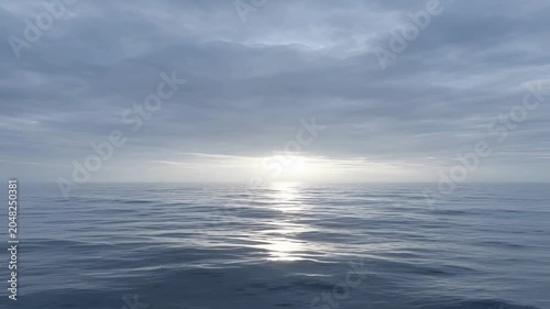 Sunset over calm ocean water.