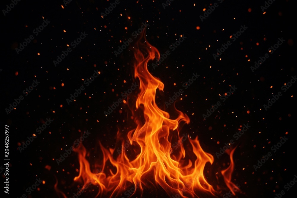 Fototapeta premium Vivid flames dance energetically upward.