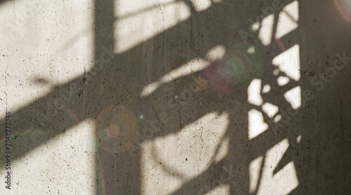 Sunlight and Shadows on Textured Concrete Wall Background
