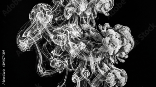 Abstract White Smoke Swirls on Black Background