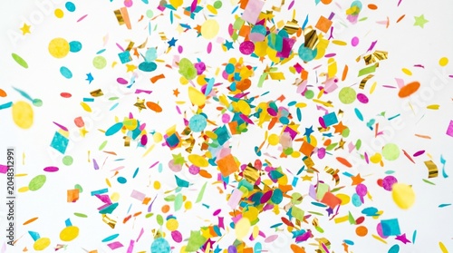 Confetti falls in a festive explosion of colorful shapes against a bright white background for celebration.