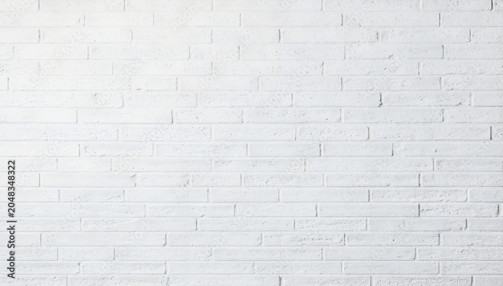 Fototapeta premium Bright seamless white painted brick wall with subtle horizontal courses and gentle relief, offering a clean modern architectural background for interiors, presentations, and minimalist designs