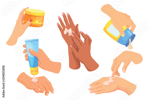 Foto Hands applying lotion