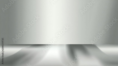 Abstract metallic surface background with studio style lighting and copy space
