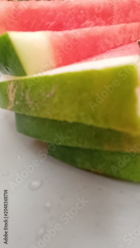 sliced watermelon on a white background