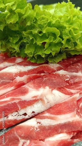 fresh raw minced meat with lettuce