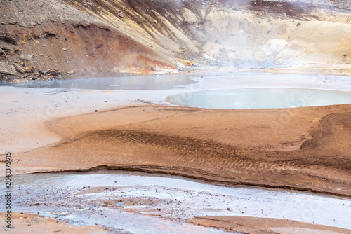 boiling water pool in Seltun, a geothermal area in Reykjanes Peninsula in Iceland on a spring day
