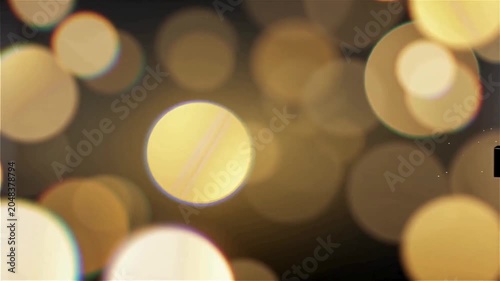 Abstract geometric shapes in black and gold luxury motion design with bokeh light effects