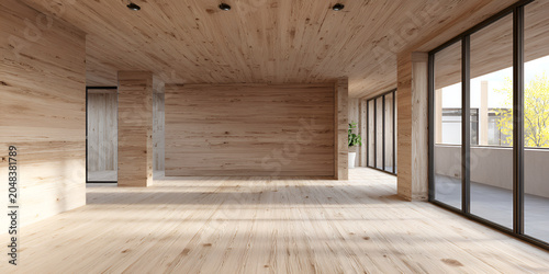 A modern interior with extensive wooden paneling on walls and ceiling. Large windows offer a view of the outside and fill the space with light