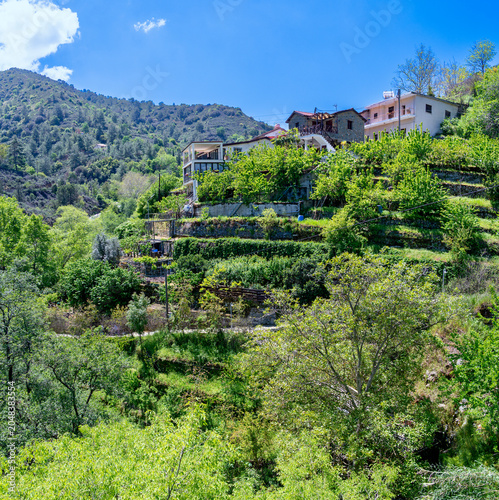 Landscape in the troodos mountains with gardens in the village of Kalopanagiotis on Cyprus