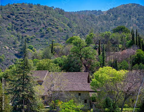 Landscape with buildings of the barn churches of Agios Ioannis Lampadistis  in the Troodos mountains in the village of Kalopanagiotis, Cyprus