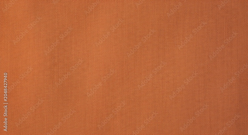 Fototapeta premium Warm Orange Textured Fabric Surface Centered on White Background