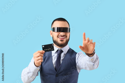 Young businessman in AR gla...