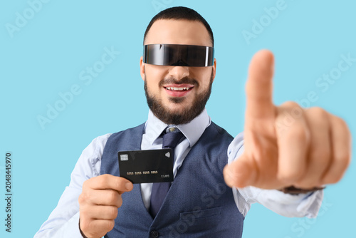 Young businessman in AR gla...