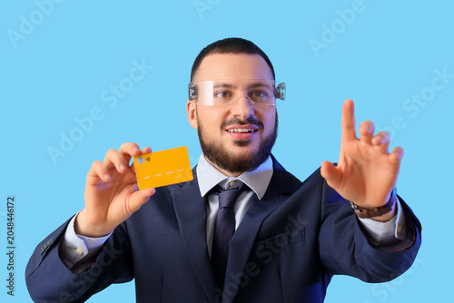 Young businessman in AR gla...