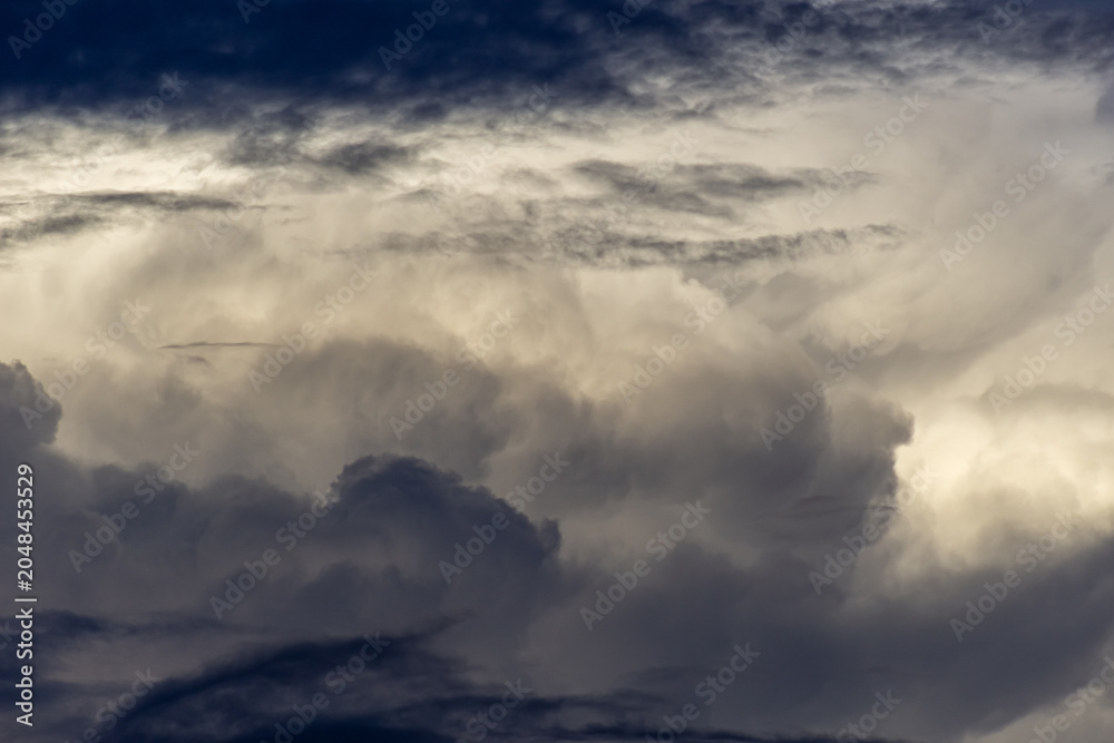 Naklejka premium Cloudscape has been developing in gorgeous form. The vast blue sky and clouds sky background.
