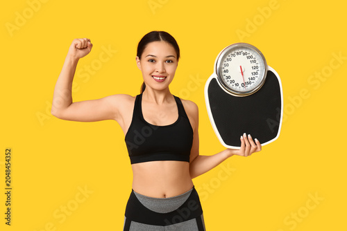 Young woman in sportswear a...